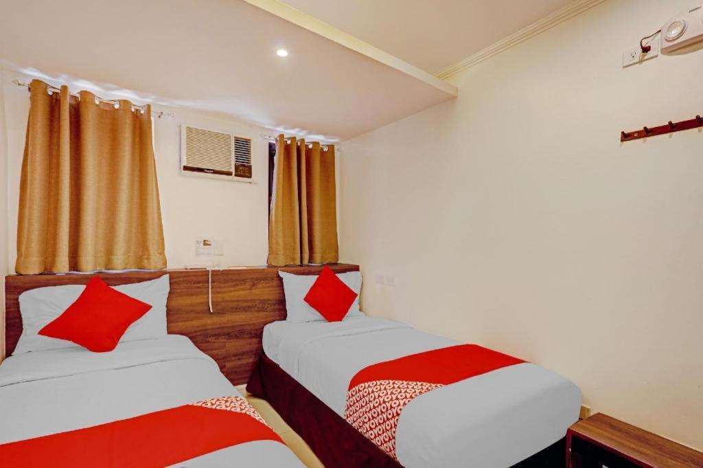 Super Oyo Capital O 232 Nest Nano Suites Fort Макати Экстерьер фото