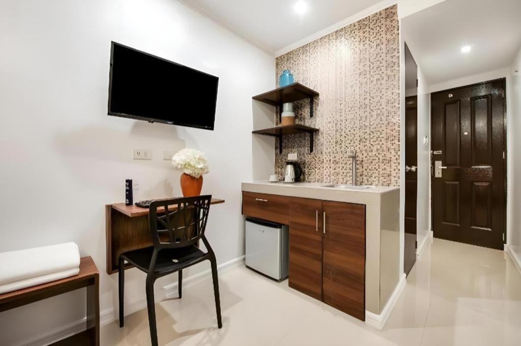 Super Oyo Capital O 232 Nest Nano Suites Fort Макати Экстерьер фото